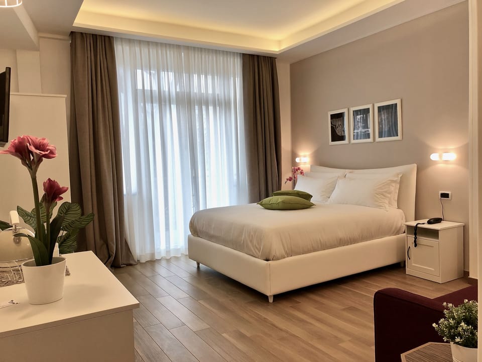 Deluxe Double Room, City View | Premium bedding, down comforters, memory foam beds, minibar