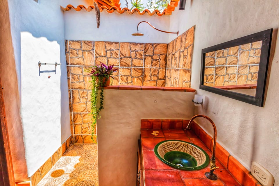 Family Quadruple Room, 1 Bedroom, Private Bathroom, Poolside (5 Beds) | Bathroom | Shower, rainfall showerhead, designer toiletries, towels