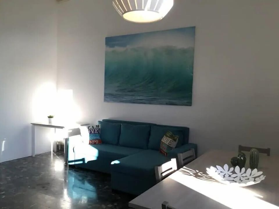Apartment, 4 Bedrooms, 2 Bathrooms | Living area | 30-cm flat-screen TV with digital channels, LCD TV