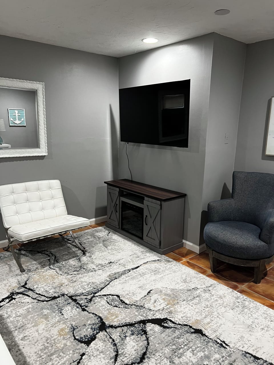 Master Bedroom showing TV and electric fireplace