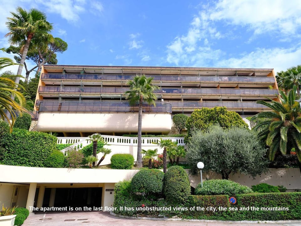 The apartment building with beautiful greenery. Apartment is on the last floor.
