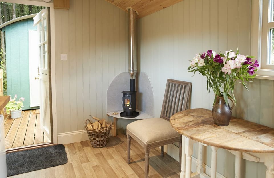The main shepherd's hut with compact yet effective wood burning stove