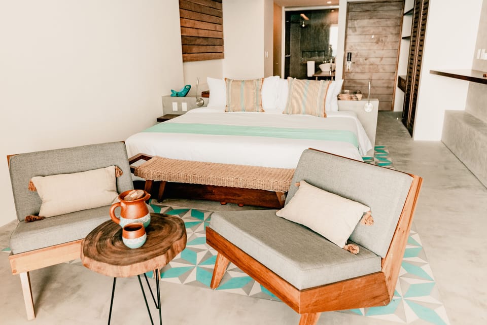 Ocean Front Jr Suite | Minibar, in-room safe, individually decorated, individually furnished