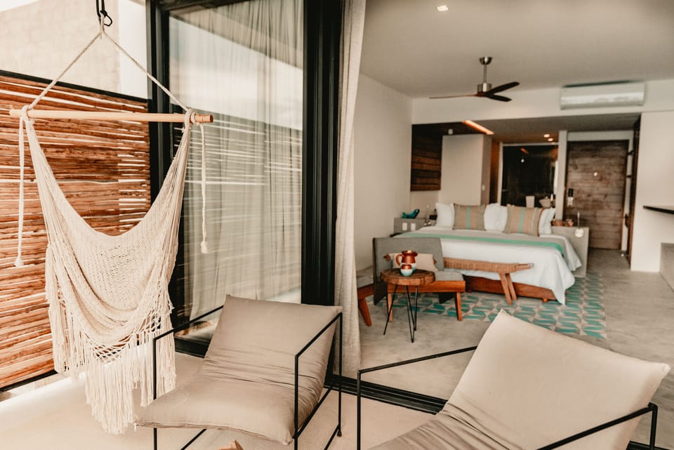 Ocean Front Jr Suite | Minibar, in-room safe, individually decorated, individually furnished