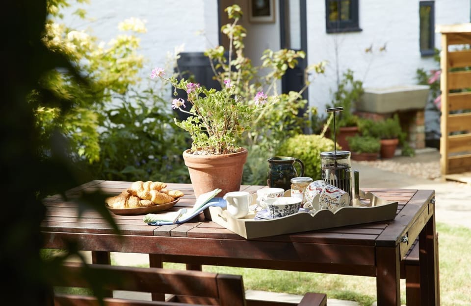 Step outside the door and enjoy breakfast in the pretty garden