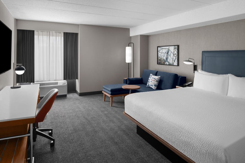 Hypo-allergenic bedding, in-room safe, desk, laptop workspace