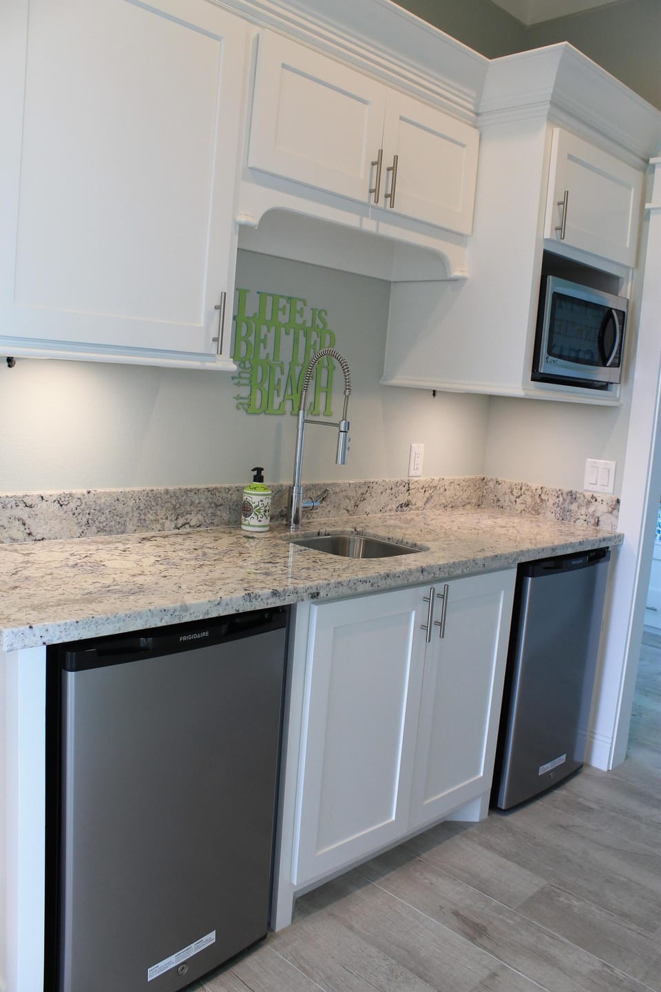 Mezzanine Level kitchenette.   Microwave,  coffee pot and 2 small refrigerators 
