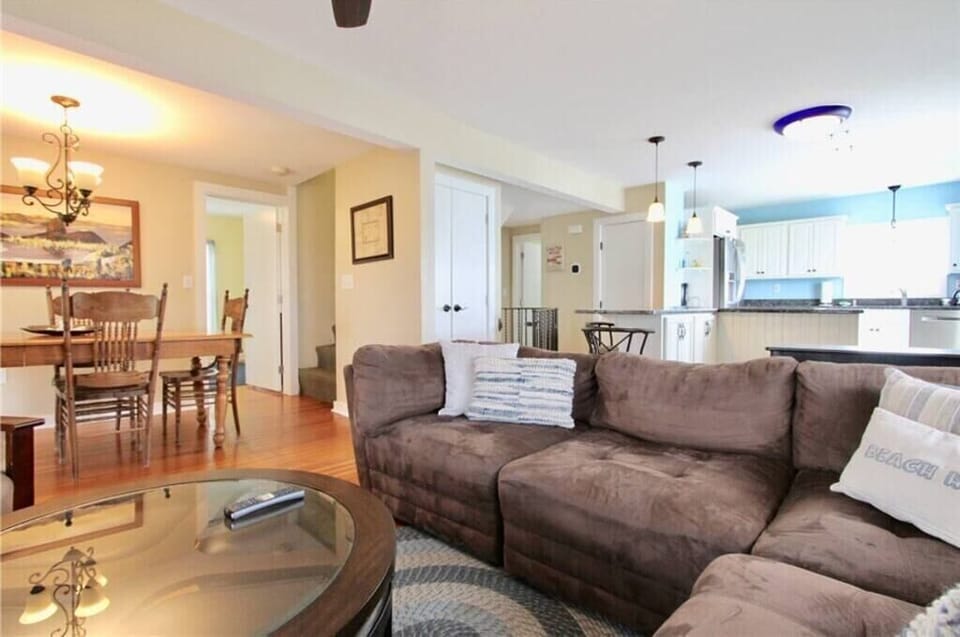 Open layout. Main floor of upstairs unit. Living, dining and kitchen area. 