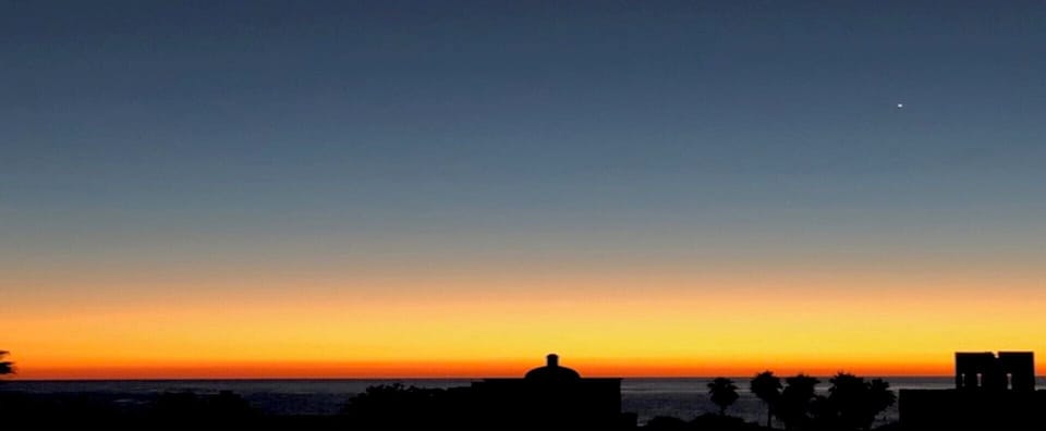 Sunrise from patio and from the master bedroom bed.
