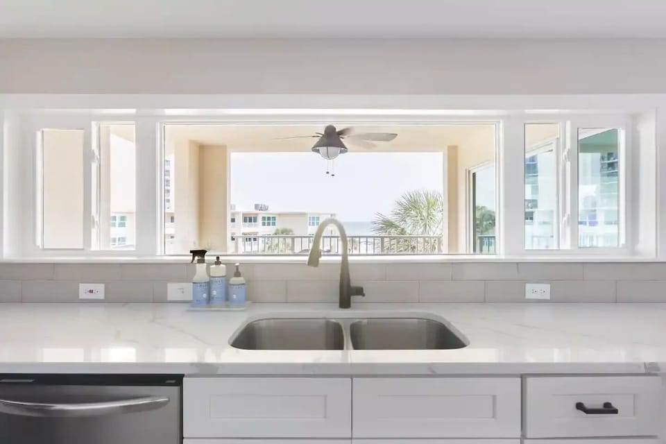 Kitchen sink with a view to the beach