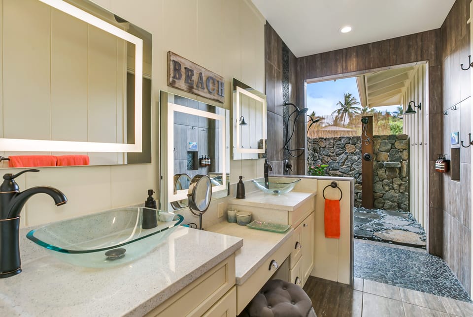 Master bathroom with outdoor lave shower.