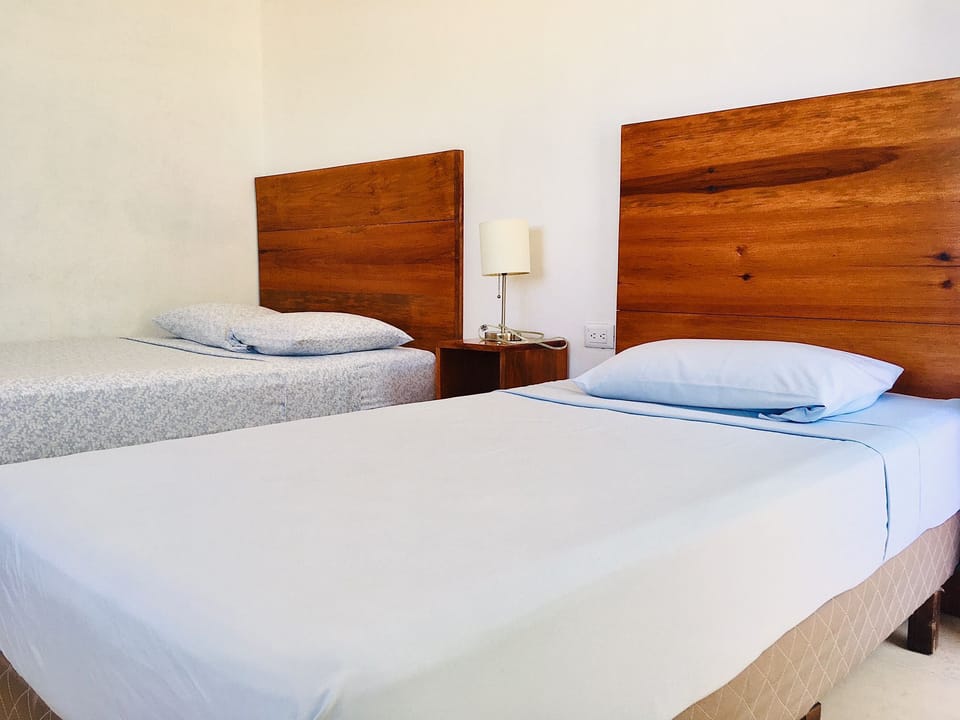 Basic Triple Room, Multiple Beds, Non Smoking | Pillowtop beds, bed sheets