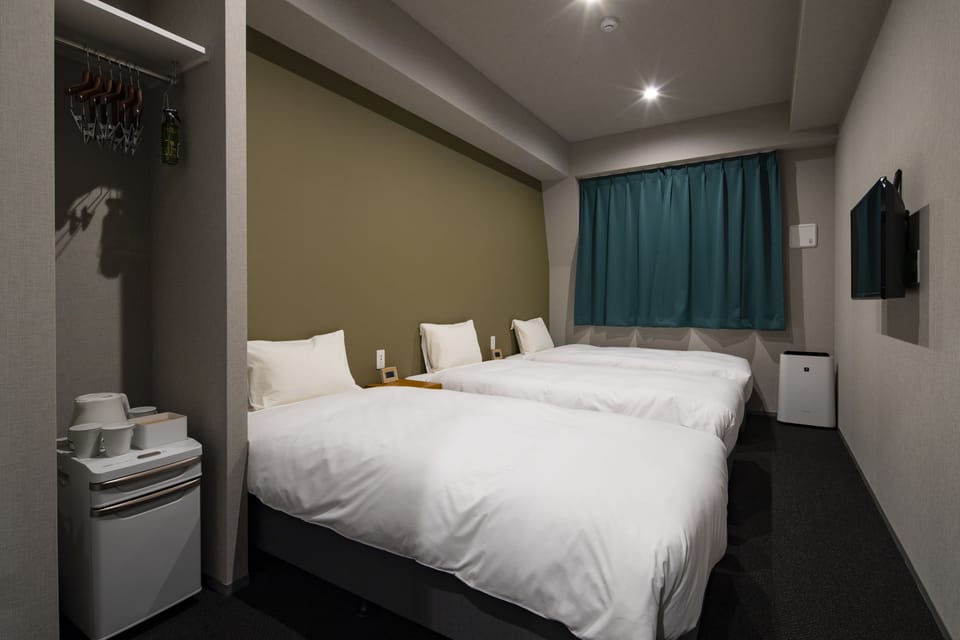 Basic Triple Room, 3 Twin Beds | In-room safe, blackout drapes, free WiFi, bed sheets