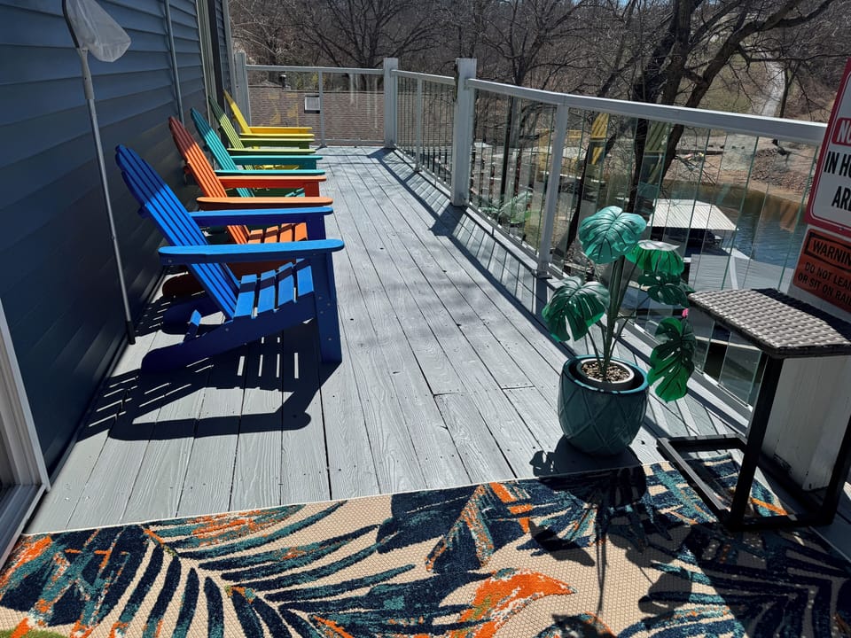 Relax on top deck in the beautiful Adirondack chairs!  Hot tub..what a view!