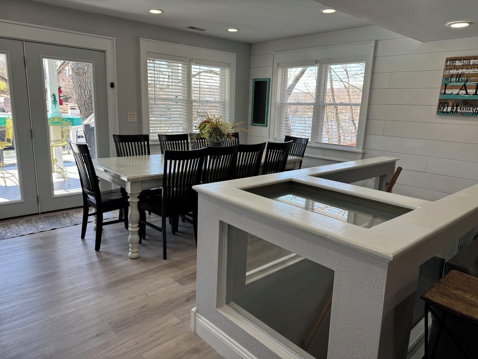 Kitchen with seating for 10 and another 4 seats at the bar area