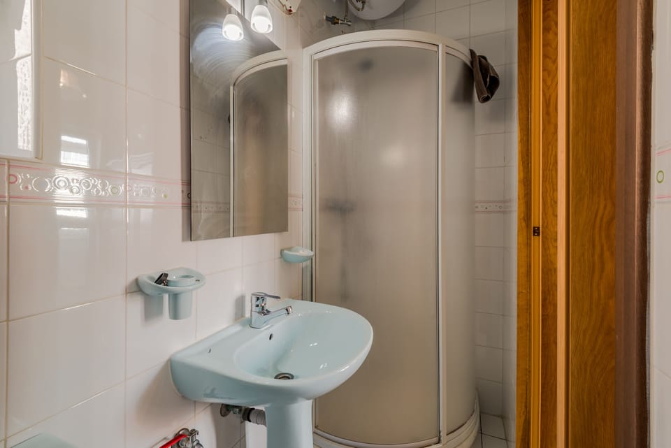 En-Suite Bathroom With Shower.