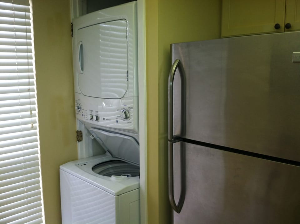 Spacious kitchen with full size washer/driver. 