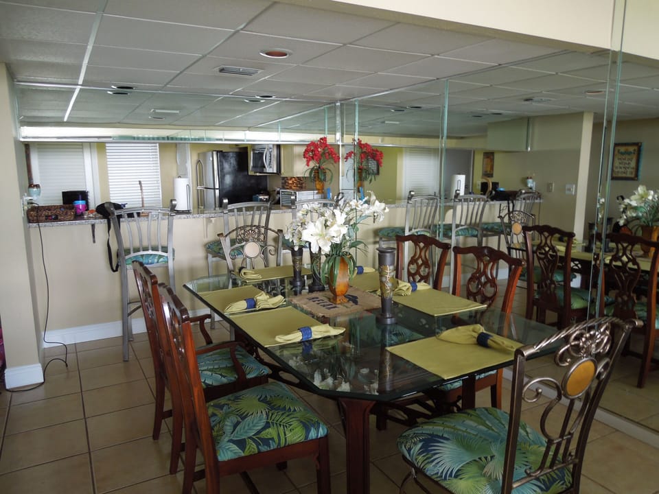 Dining room seats six with three additional at bar area!