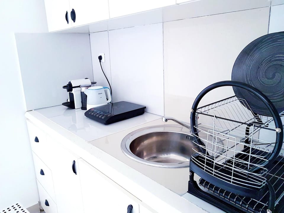 Full-size fridge, microwave, stovetop, espresso maker
