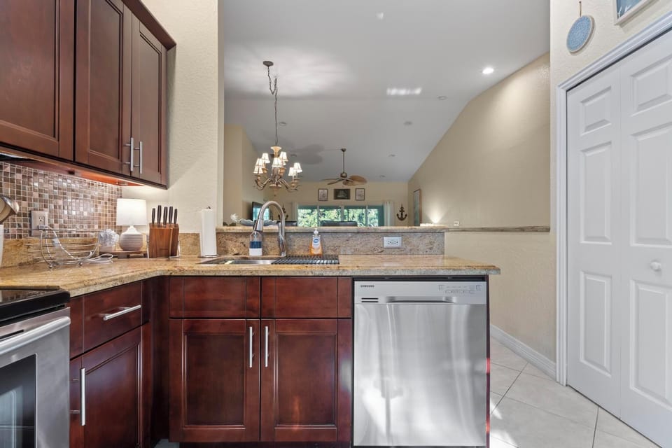 Kitchen overlooking the open concept that our guests love! 