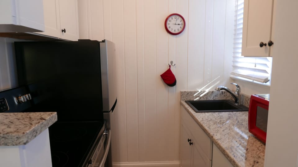 Fully equipped kitchen including dishwasher, coffeemaker, toaster microwave