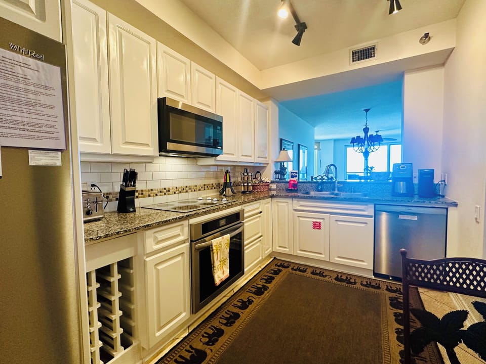 Kitchen is Outfitted with Granite Counter tops and a full set of Appliances