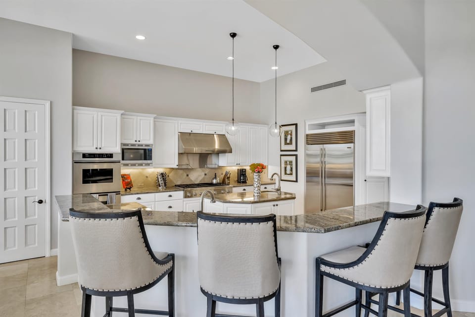 Kitchen counter with bar stools
