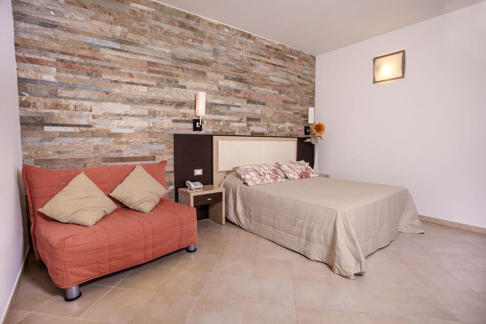 Junior Suite, Patio | Egyptian cotton sheets, premium bedding, down comforters, minibar