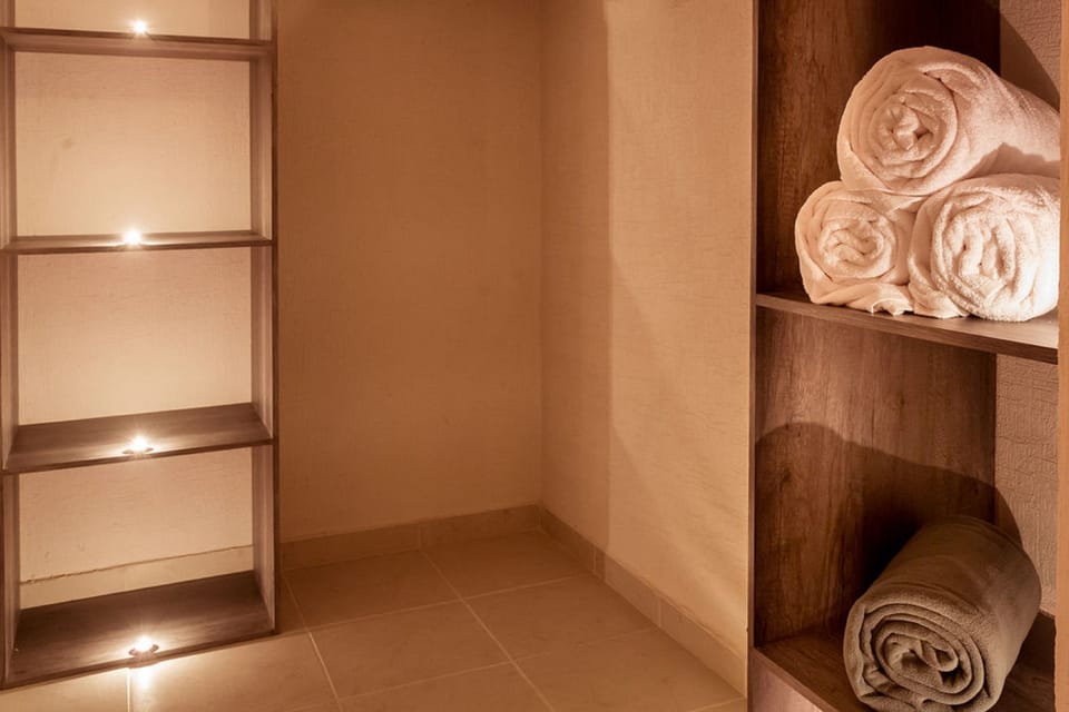 Holiday House, 3 bedrooms, 3 bathrooms, living room, and kitchen | Bathroom | Shower, rainfall showerhead, towels