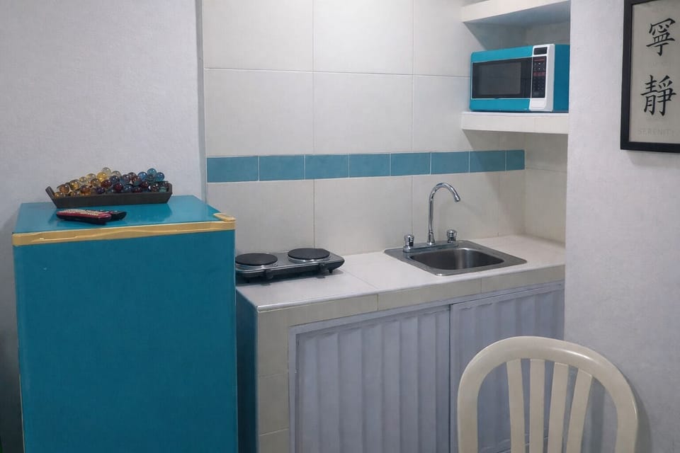 Design Triple Room, 1 Double Bed, Non Smoking | Private kitchen