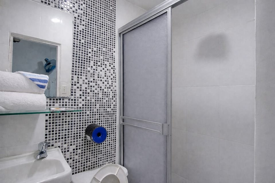 Design Double Room Single Use, 1 Double Bed, Non Smoking | Bathroom | Shower, designer toiletries, hair dryer (on request), towels