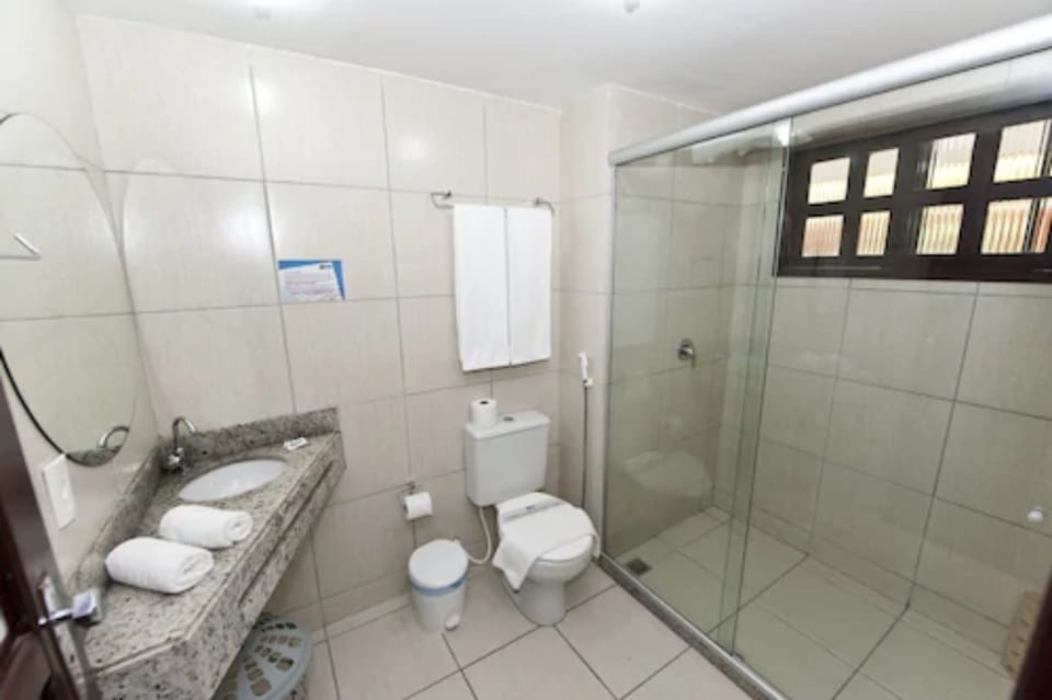 Shower, towels, soap, toilet paper