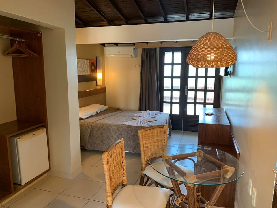 Deluxe Double Room, Sea View | Minibar, desk, blackout drapes, free WiFi
