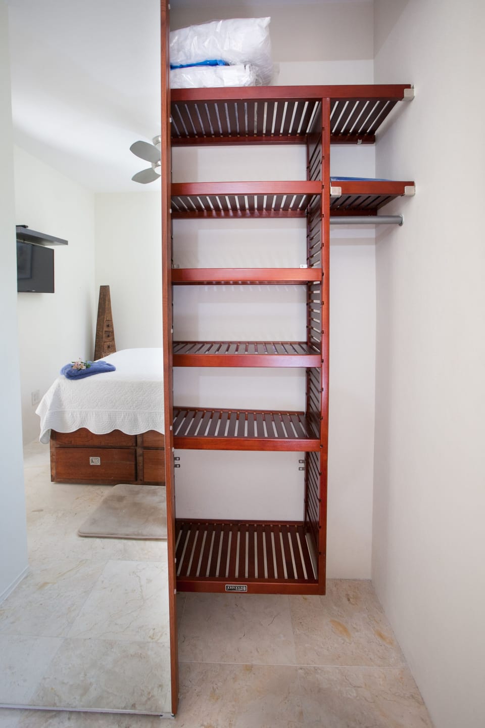 Closet with mirrored sliding door