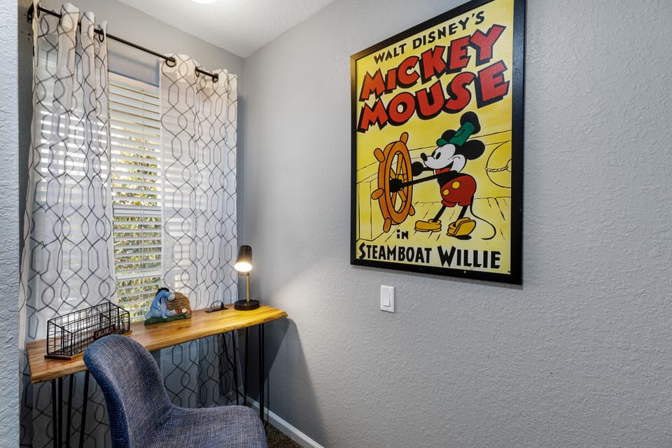 Here you can check your emails. 
Desk with USB and table lamp.