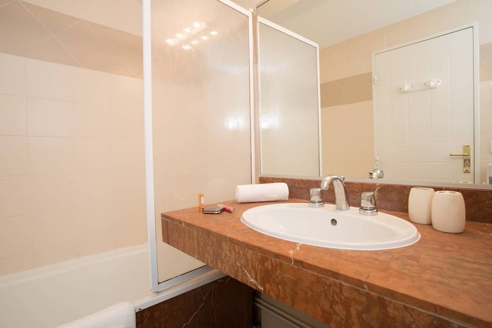 Get ready for your day in the lovely bathroom.