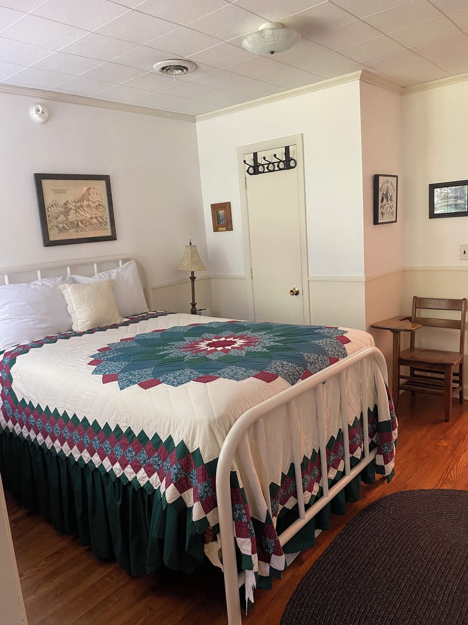 Middle bedroom. Full size bed. Back bedroom is accessed through this room. 