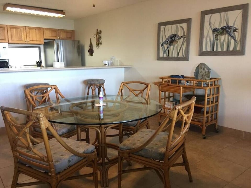 Spacious living (view from couch towards dining table & kitchen)