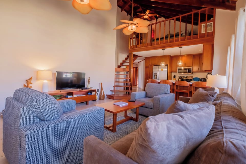 Living room with stairs to loft