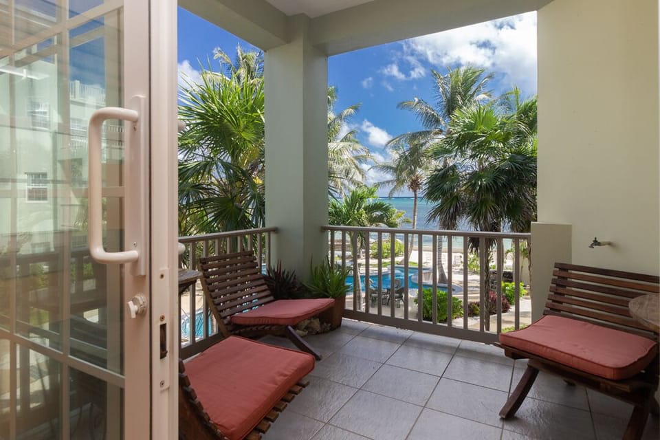 Private patio with beautiful pool, beach and ocean views