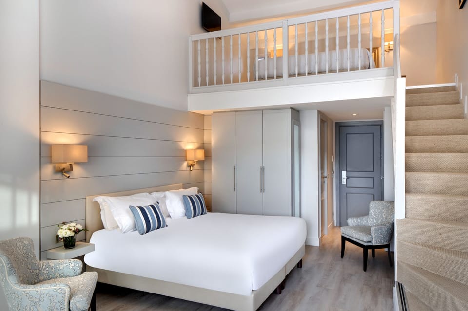 Deluxe Quadruple Room | Premium bedding, minibar, in-room safe, individually decorated
