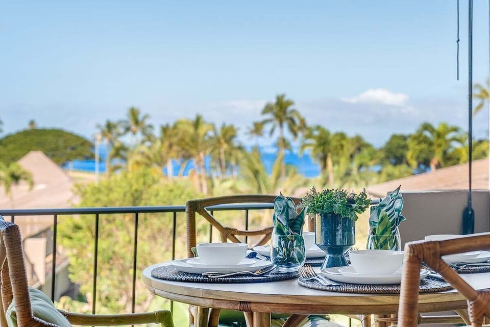 Charming furnished lanai ideal for lounging or dining al fresco overlooking the resort and Pacific ocean