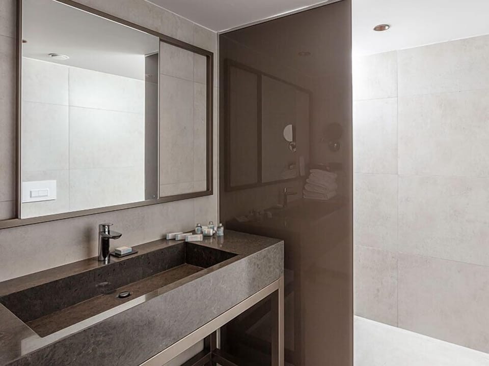 Shower, free toiletries, hair dryer, slippers