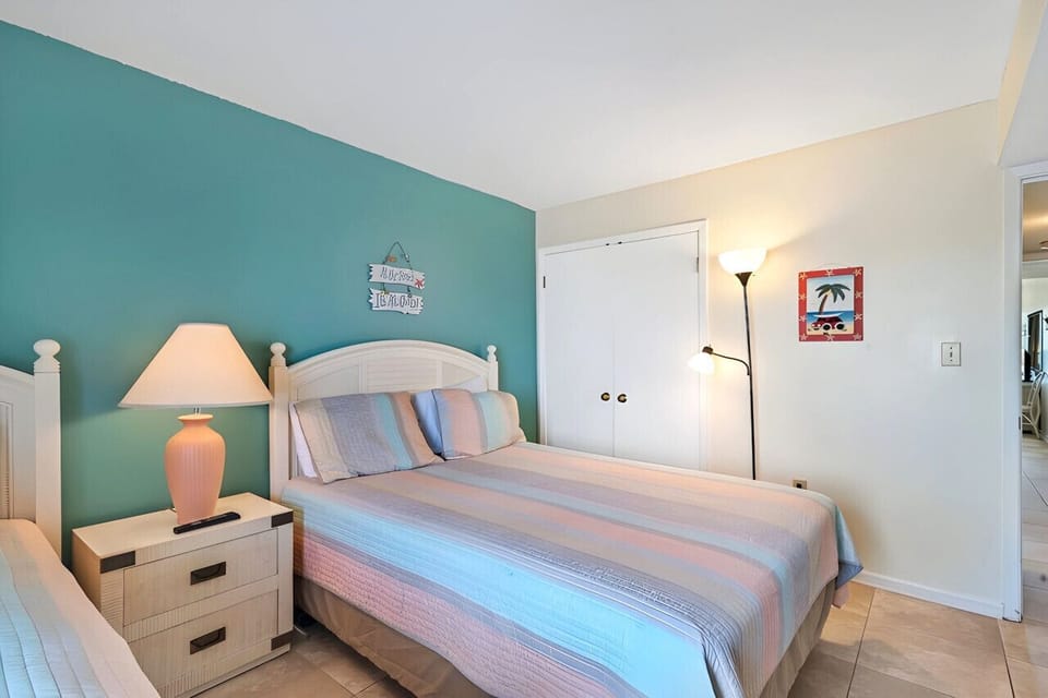 Queen and twin beds in the front bedroom