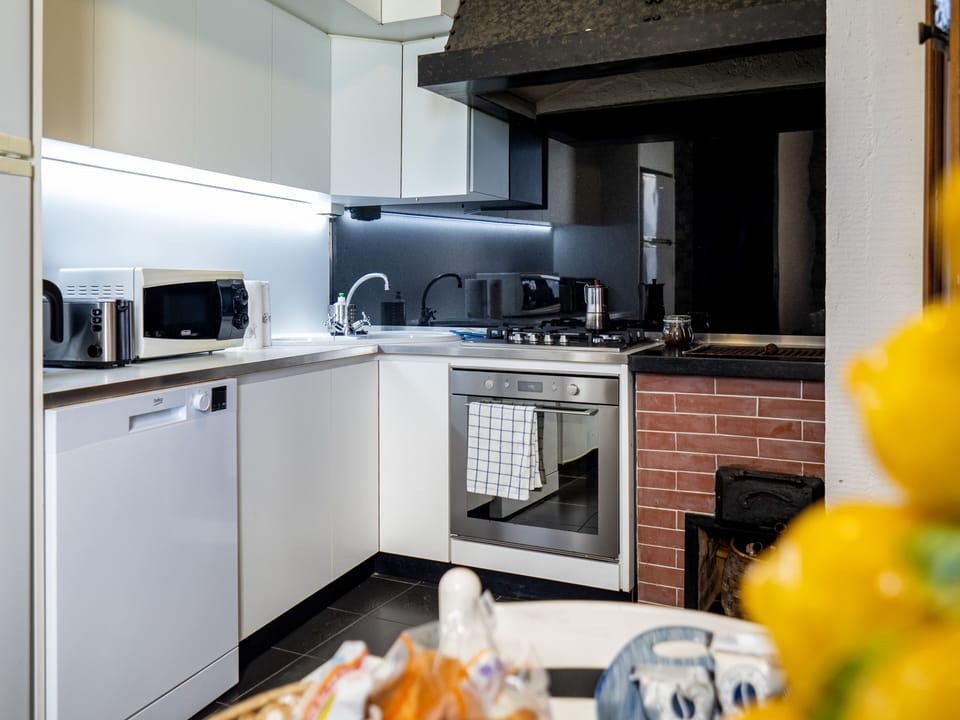 Apartment, 2 Bedrooms, 2 Bathrooms | Private kitchen | Full-size fridge, microwave, oven, stovetop