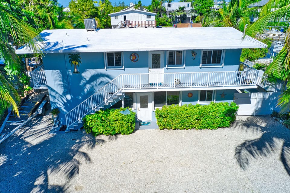 Front of the house and parking area