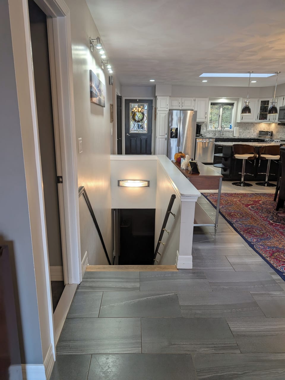 Stairs to Lower level with 3 other bedrooms