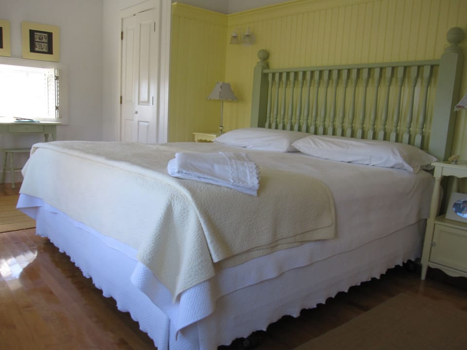 King Size Bedroom-reclaimed porch railing from Hervochon's 1846 Federal Home