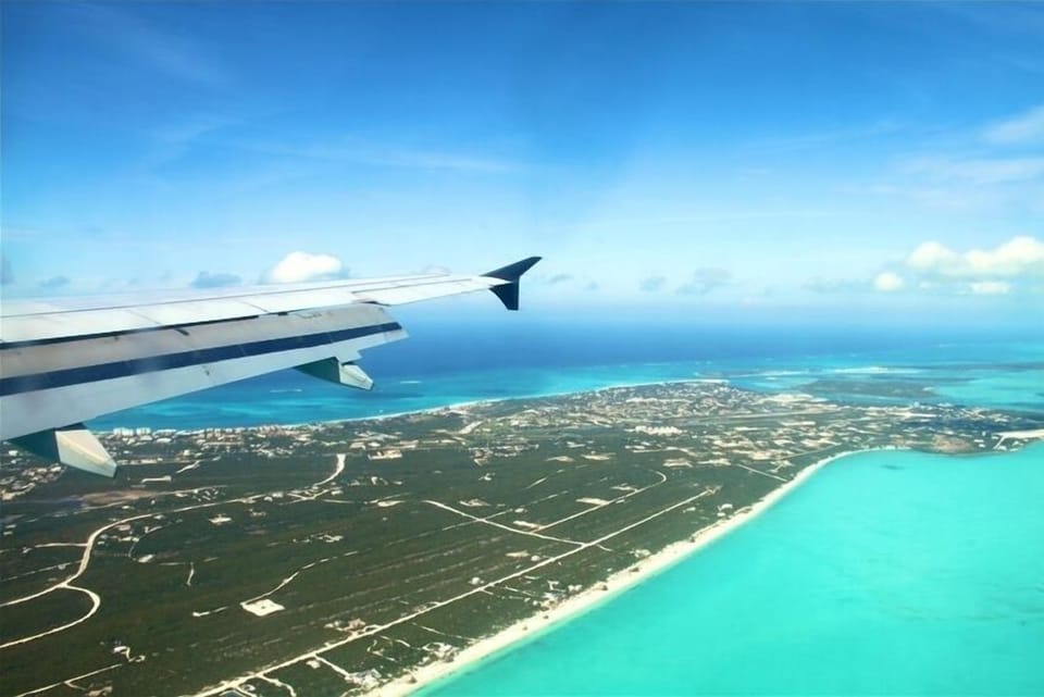 Arrival from above .. Villa Renaissance is just out of sight below the wing