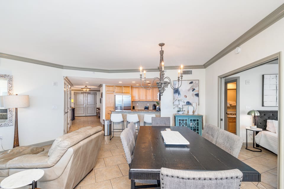 Step into your open-plan haven where coastal elegance meets home comfort. Sunlight flows through every corner, connecting your dining, kitchen, and living spaces in a layout designed for gathering and relaxation.